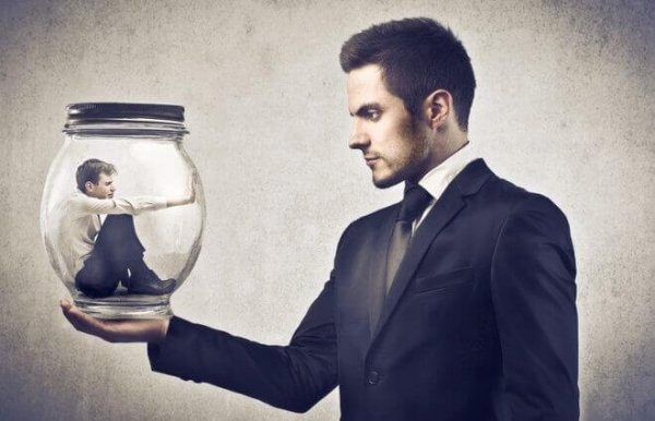 A man holding a bottle with a man inside represents little employee protection.