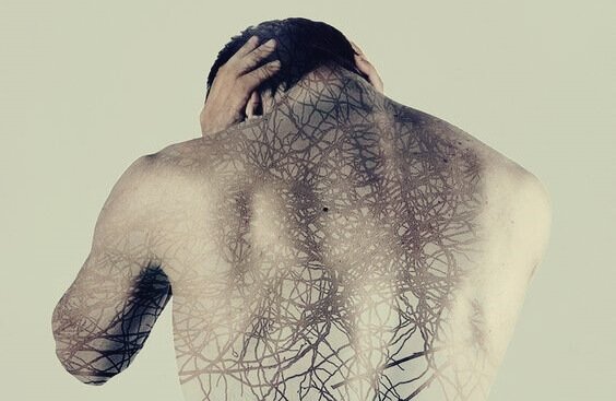 Man with back full of roots.