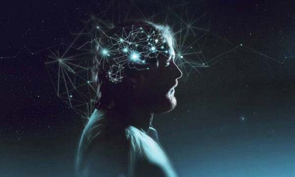 Man in a state of optimal experience and flow, with lights shining in his mind.