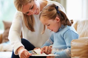 Mom and daughter and learning to read.