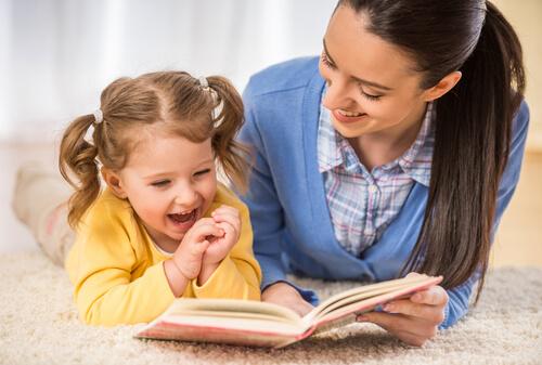 Mother and daughter reading together.
