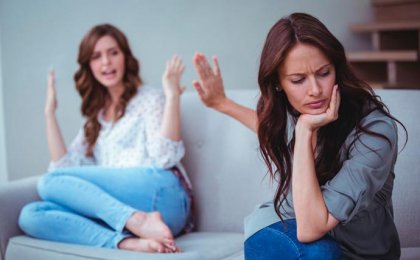 Two women argue.