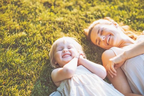 Mother and daughter smiling.