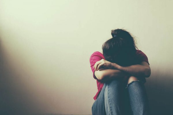 Woman feeling blame.