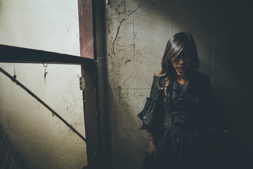 Girl in the shadows.