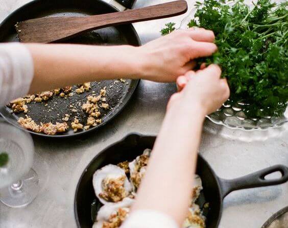 A woman cooking.