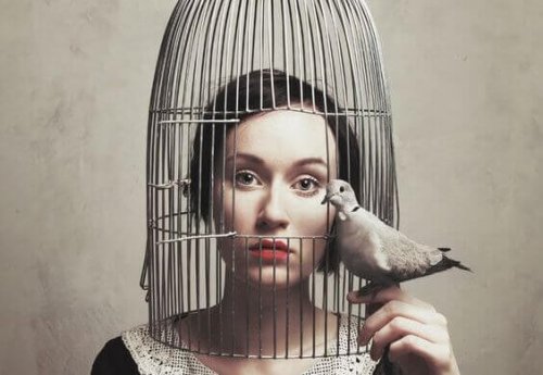 A woman in a cage being too silent.