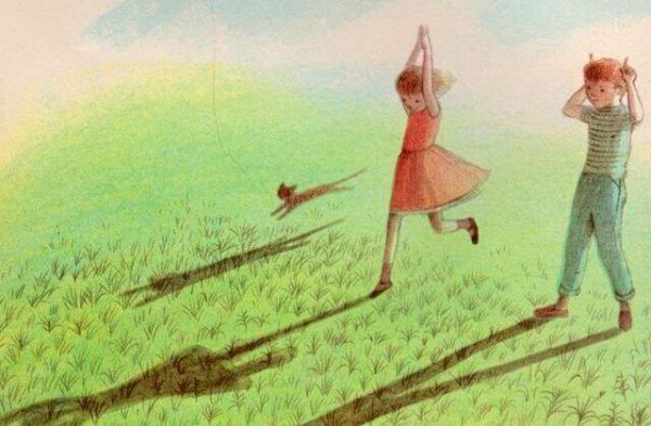 Girl playing in the grass.