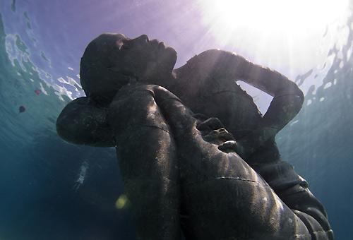 A sculpture by Jason deCaires Taylor.