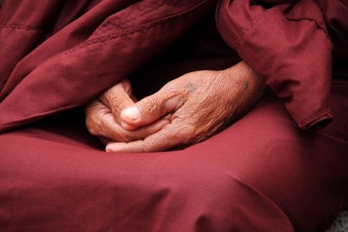 The hands of a monk.