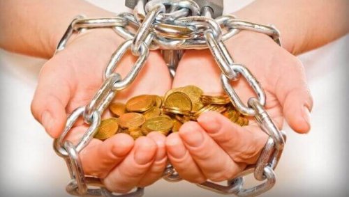 Tied hands holding coins.