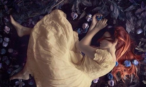 Woman lying on the ground.