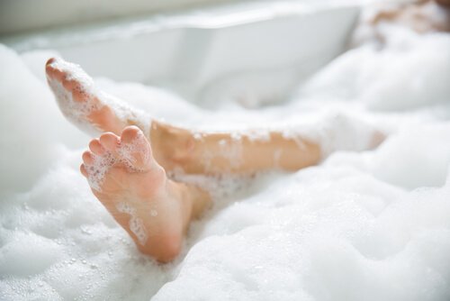 Woman in a bathtub.
