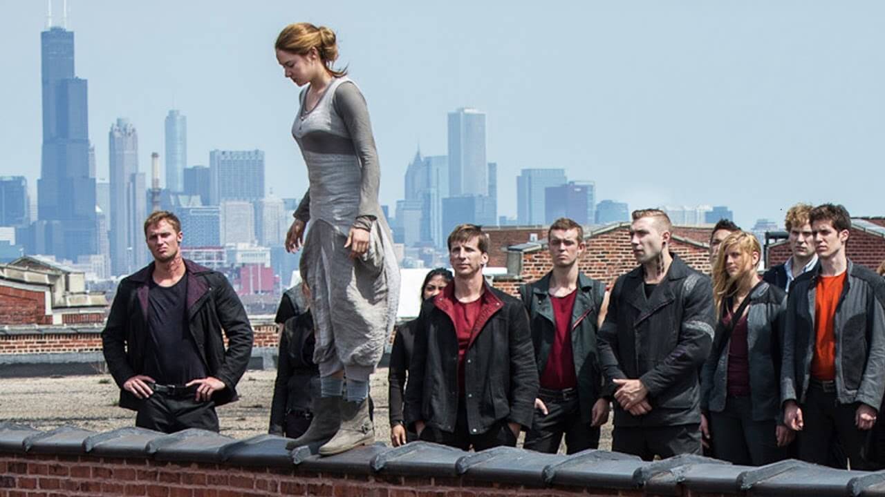 Men watching a woman jumping.