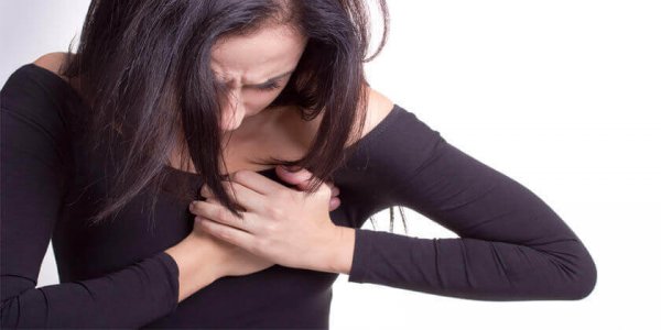 Woman with pain in her chest.