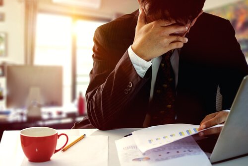 man at work thinking about other people's approval of him