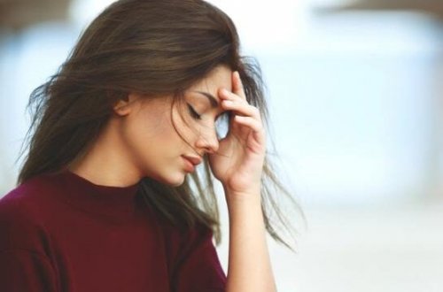 Woman experiencing emotional somatization.