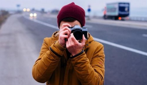 Person taking a photograph.