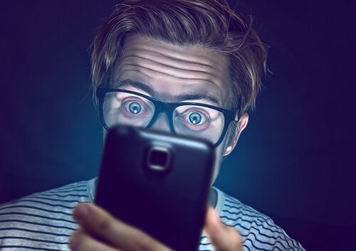 A man addicted to WhatsApp.
