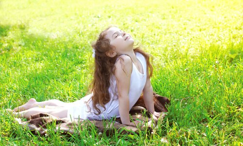 A child doing yoga.