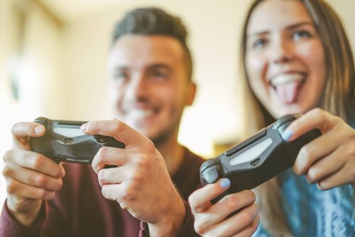 A couple playing video games.