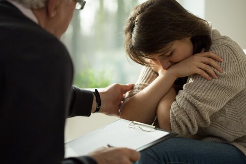 A woman receiving help for abuse.