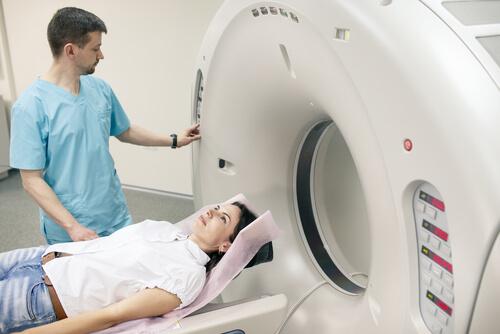 A woman getting an MRI scan.