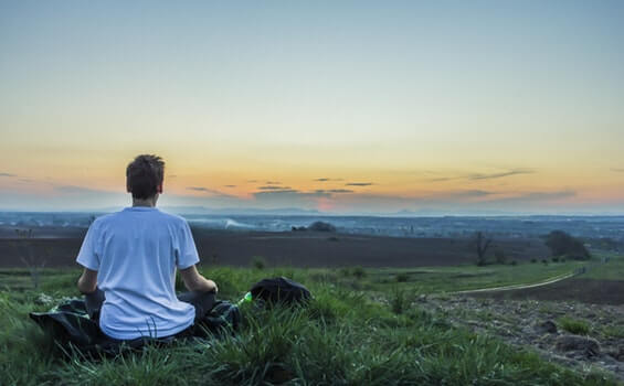 A man doing Vipassana meditation.