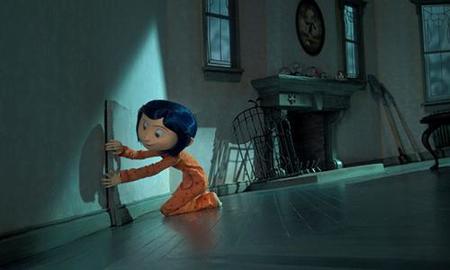 Coraline opening door on the wall.