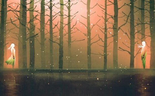 A couple in a forest.