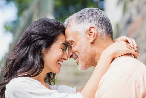 A couple looking at each other with genuine kindness.