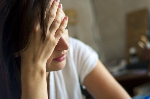A woman feeling tired.