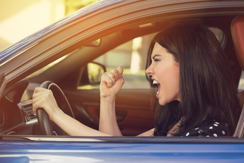 An angry driver in her car.