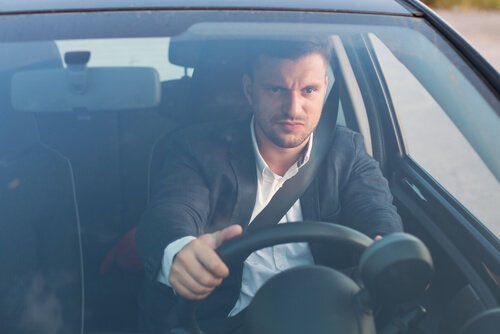 Angry driver behind the wheel.