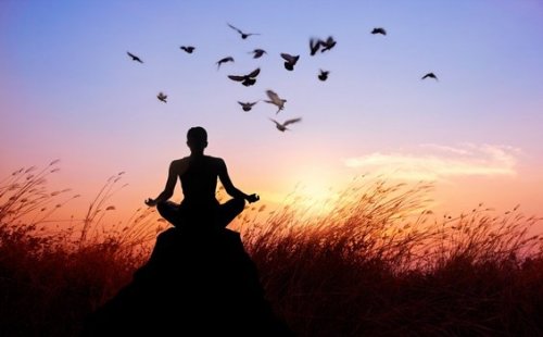 Buddhist monk meditating.