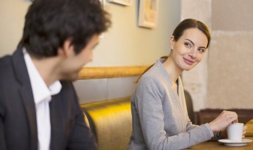 A man and a woman expressing themselves through body language.