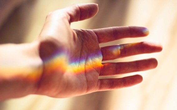 Hand with beam of light.