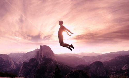 A man jumping after having overcome resistance to change.