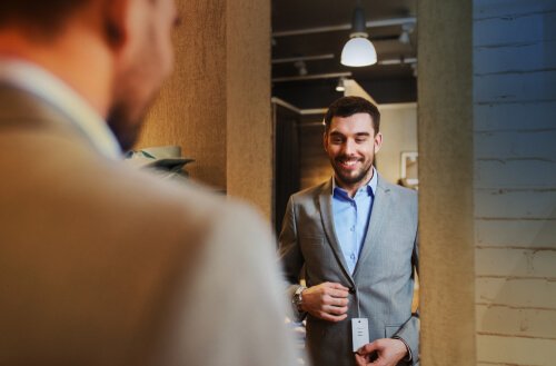 A man expressing his individuality (psychology of fashion) while wearing a suit.