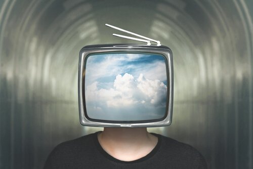 A man with a TV on his head.