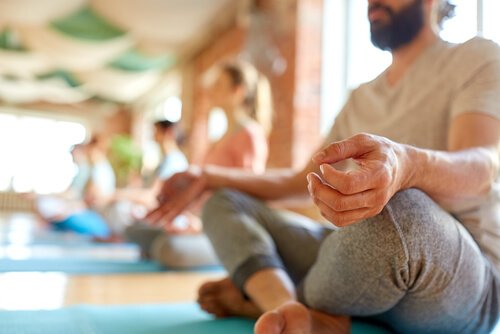 People meditating in a silent retreat.