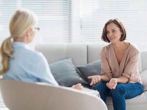 Woman talking to psychologist about compassion fatigue.