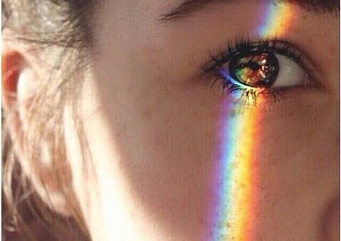A rainbow on the eye representing aesthetic intelligence.