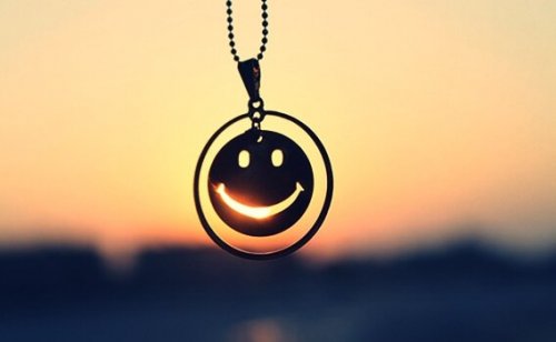 Smiley face necklace.