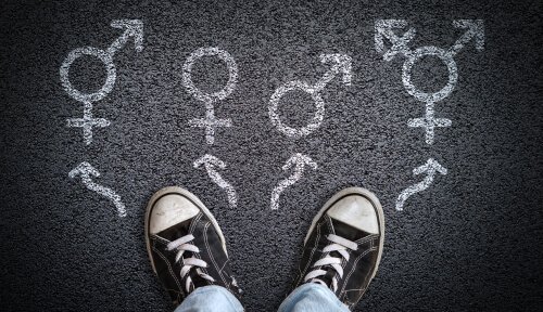 Feet depicting what direction they should go in regarding gender identity.