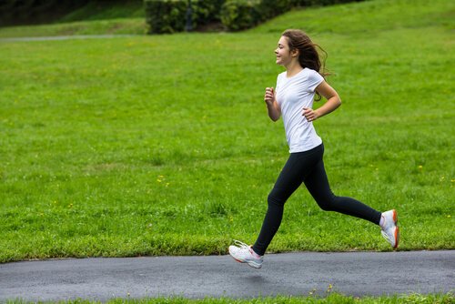 Girl running in the park.