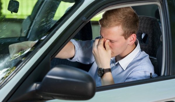 Man with narcolepsy in his car.