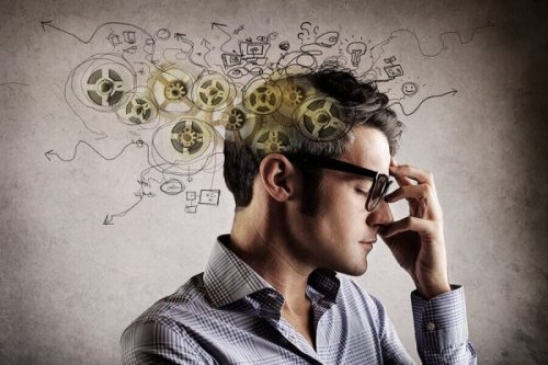 A man wearing glasses and thinking.