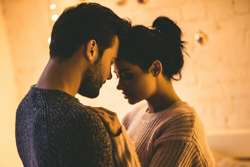 Couple embracing.