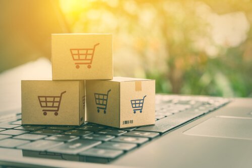 Boxes with shopping carts as psychological strategies used in marketing.
